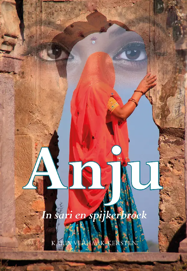 Anju in sari en spijkerbroek